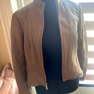 T- Tahiti leather jacket. Lightly worn